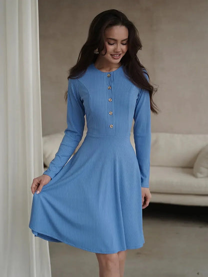 Soft sky-blue mini dress with long sleeves and front button placket, perfect for weddings and summer events.