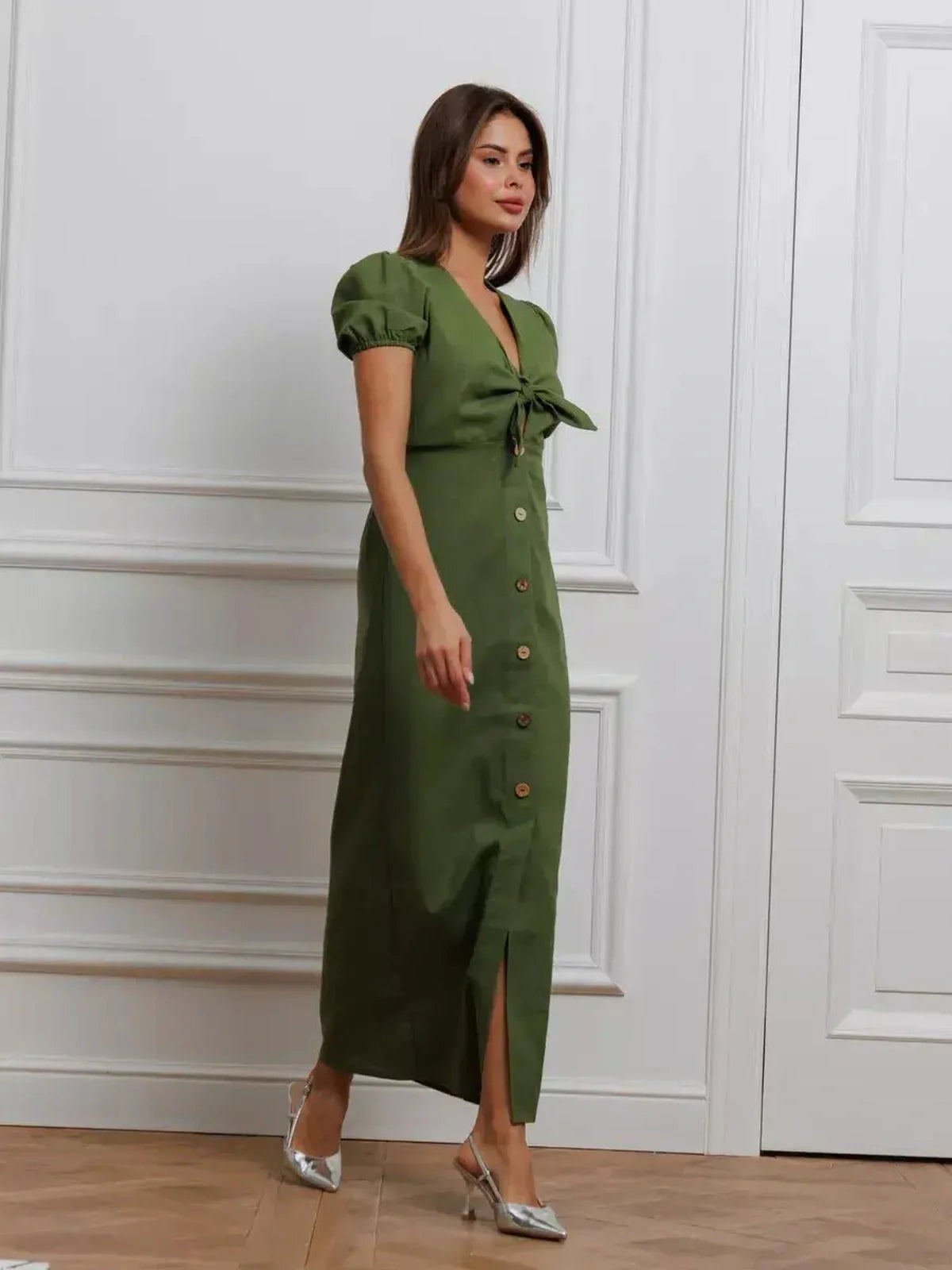 Olive Whisper Maxi Dress with puff sleeves and tie front detail, offering elegant style for summer and formal occasions.