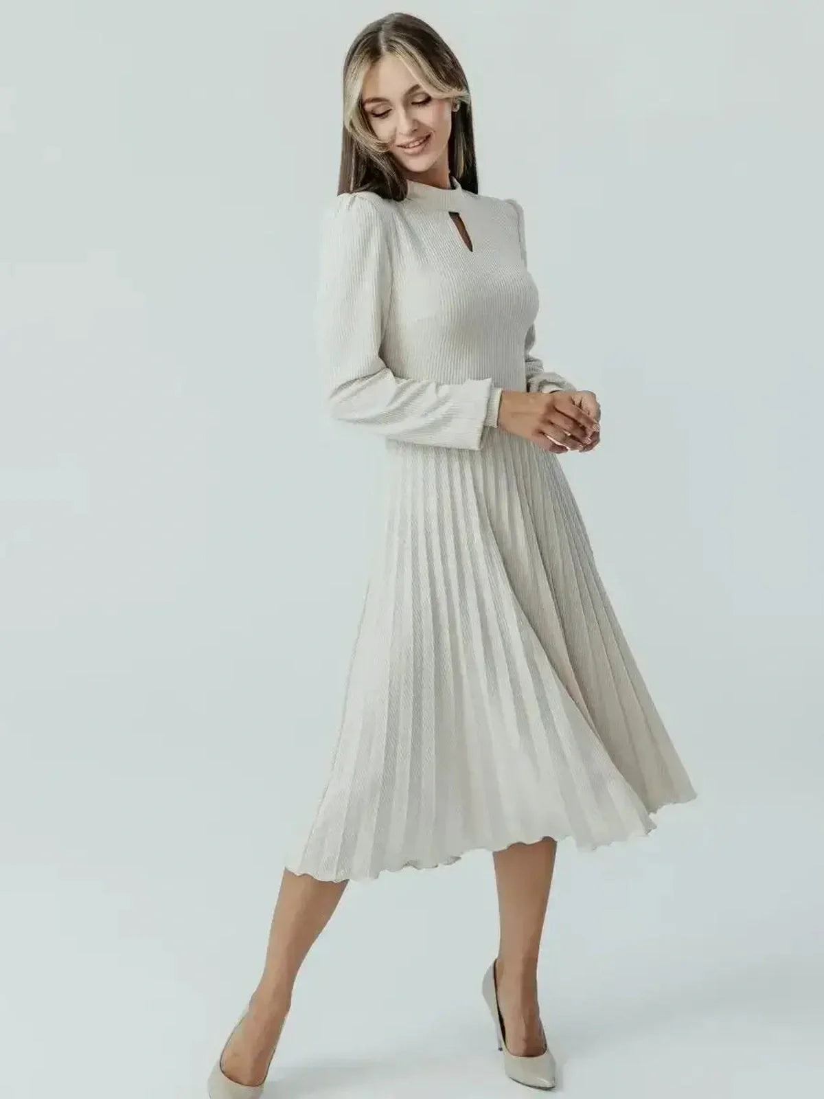 Grace Pleat Midi Dress in soft ribbed knit with flared pleated skirt and keyhole cutout, perfect for weddings and formal events.