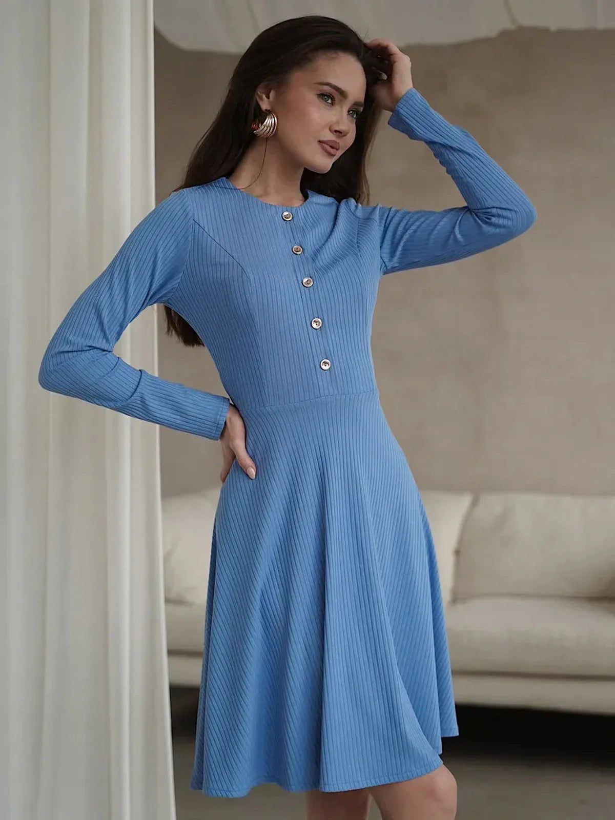 Skyline Muse mini dress in sky blue, featuring ribbed knit and button placket, perfect for weddings and special occasions.