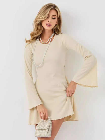 Ivory Flare mini dress with flared bell sleeves, perfect for summer, weddings, or special occasions.
