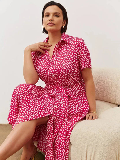 Petal Pop Midi Dress in vibrant fuchsia with abstract white petals, perfect for summer, casual outings, or weddings.