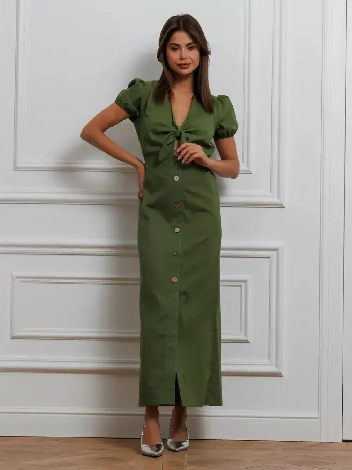 Olive Whisper Maxi Dress featuring puff sleeves, tie front, and elegant khaki design, perfect for summer weddings or special occasions.