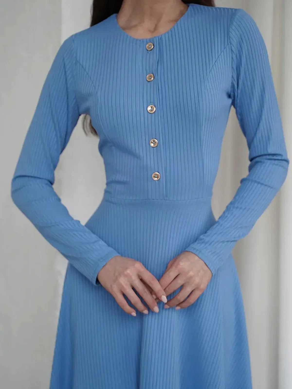 Skyline Muse sky-blue mini dress featuring ribbed knit fabric and button placket, perfect for wedding guest or cocktail occasions.