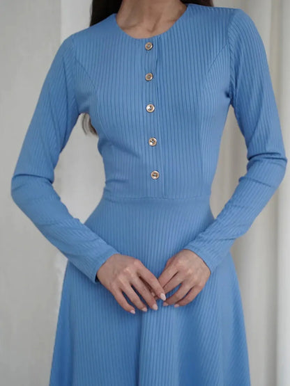 Skyline Muse sky-blue mini dress featuring ribbed knit fabric and button placket, perfect for wedding guest or cocktail occasions.