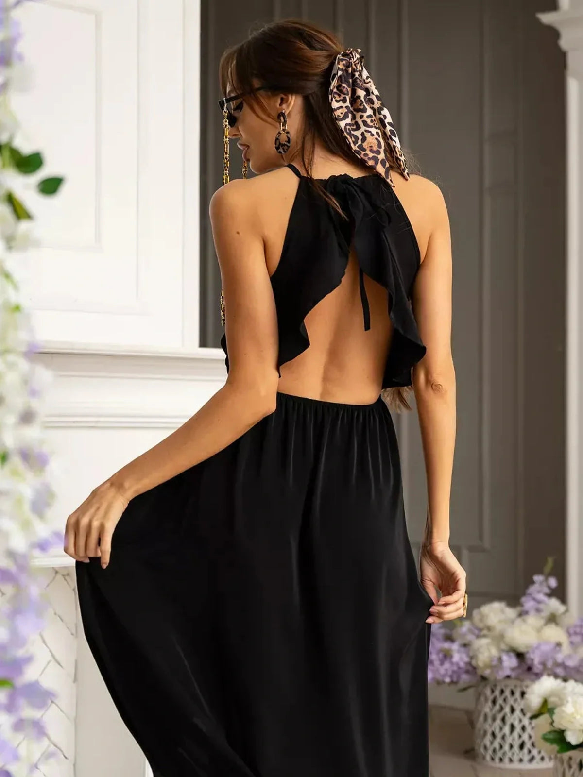 Elegant Soirée Midi Dress featuring a romantic open back and flowing A-line silhouette, perfect for summer events.