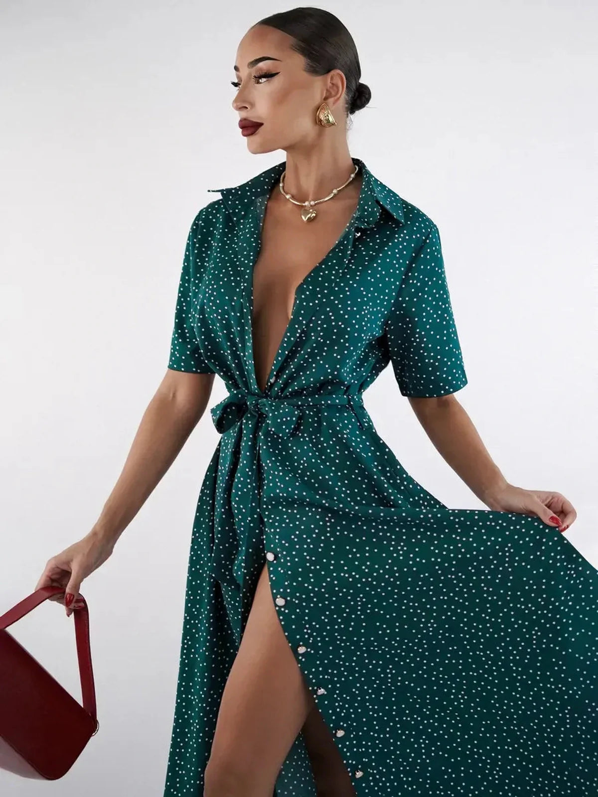 Emerald Dot Midi Dress featuring a cinched waist, V-neckline, and white polka dots, perfect for summer and special occasions.