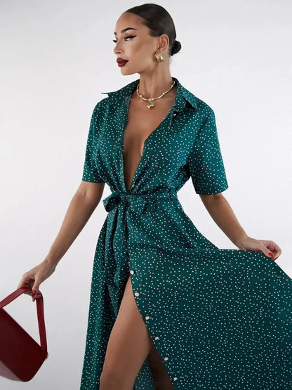 Emerald Dot Midi Dress featuring a cinched waist, V-neckline, and white polka dots, perfect for summer and special occasions.