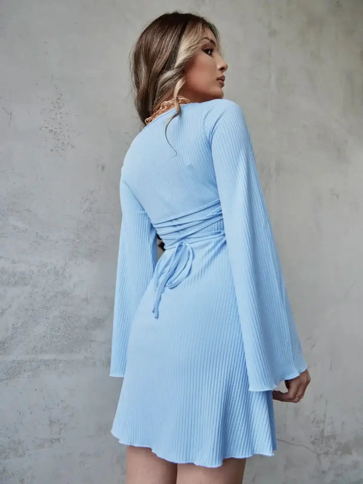 Light blue Sky Flare Mini Dress with flared sleeves and adjustable ties, perfect for summer and casual occasions.