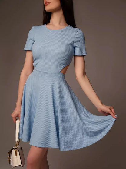 Stylish blue mini dress with cut-out waist, perfect for summer brunches and beachside events.