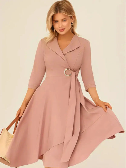 Blush Charm Midi Dress showcasing a draped wrap silhouette with an asymmetric hemline, perfect for formal occasions and celebrations.