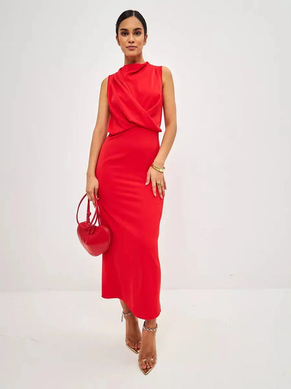 Model wearing a stunning red drape maxi dress, perfect for formal events and summer occasions, showcasing elegant style.