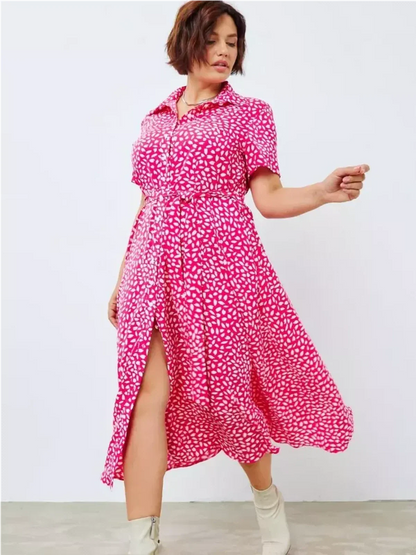 Elegant Petal Pop Midi Dress in vibrant fuchsia with white petal print, perfect for summer weddings and casual outings.