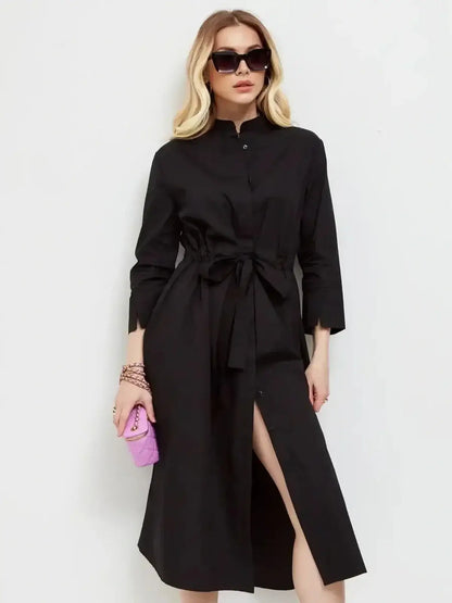 Noir Grace Midi Dress featuring a sleek A-line silhouette with waist tie, perfect for weddings, formal events, and everyday wear.