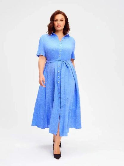 Skyline Dot Midi Dress in light blue, featuring a flattering V-neckline, button front, and A-line silhouette, ideal for summer wear.