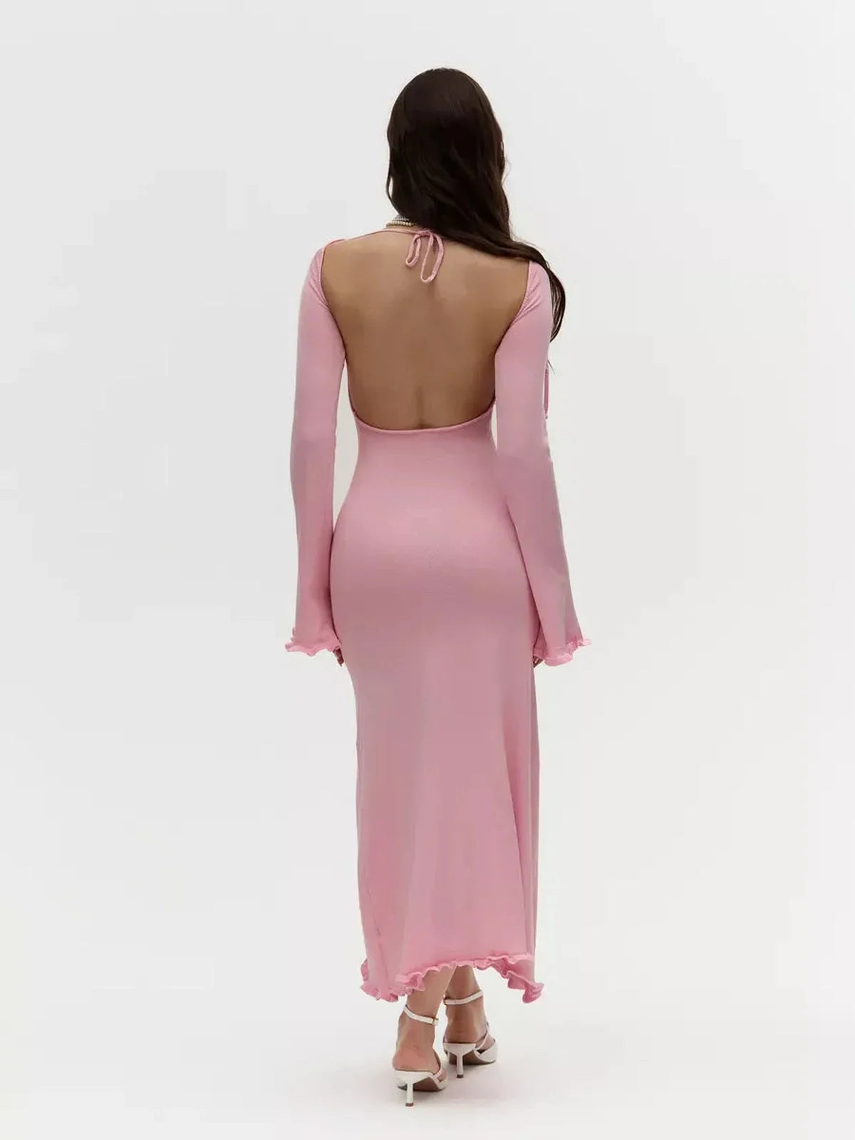 Elegant blush hour midi dress featuring bell sleeves and open back, perfect for summer weddings or special occasions.