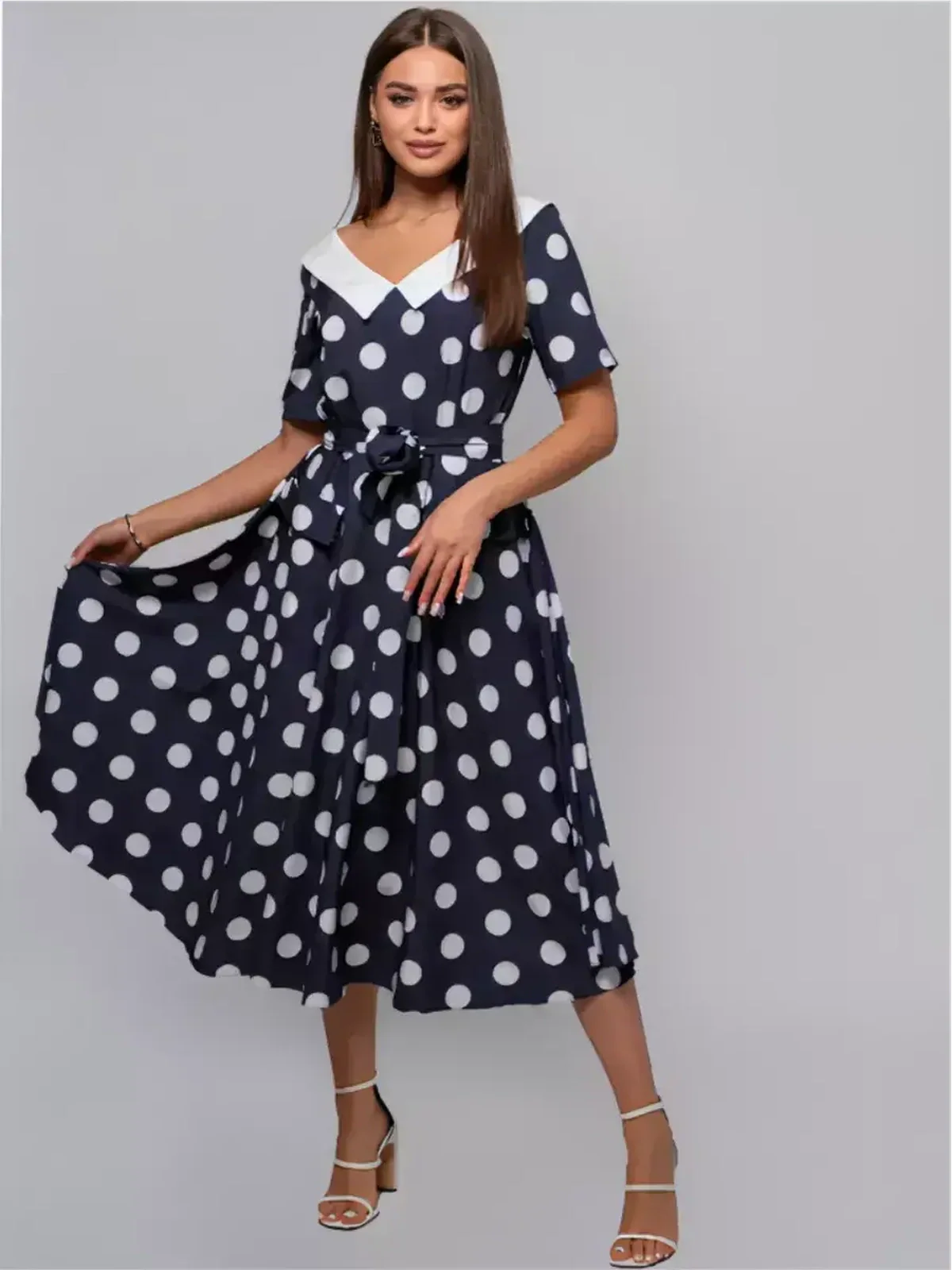 Nautical Charm Midi Dress featuring classic polka dots, a white collar, and a flared silhouette perfect for summer events.