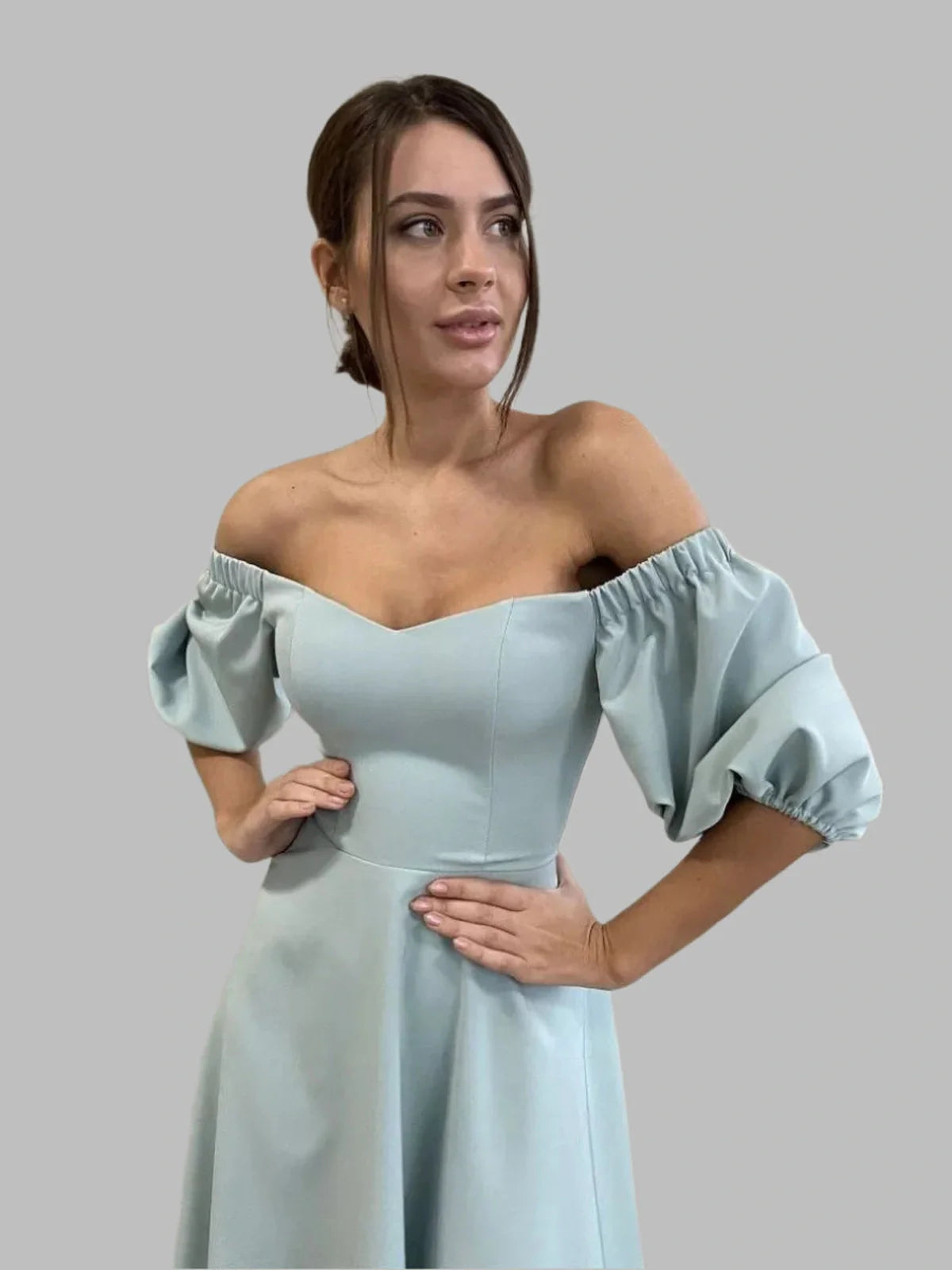 Serenity Midi Dress in mint blue, featuring an off-shoulder design and voluminous puff sleeves, perfect for weddings and formal events.