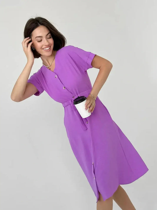 Lavender midi dress with short sleeves and waist tie, perfect for summer weddings and casual outings.