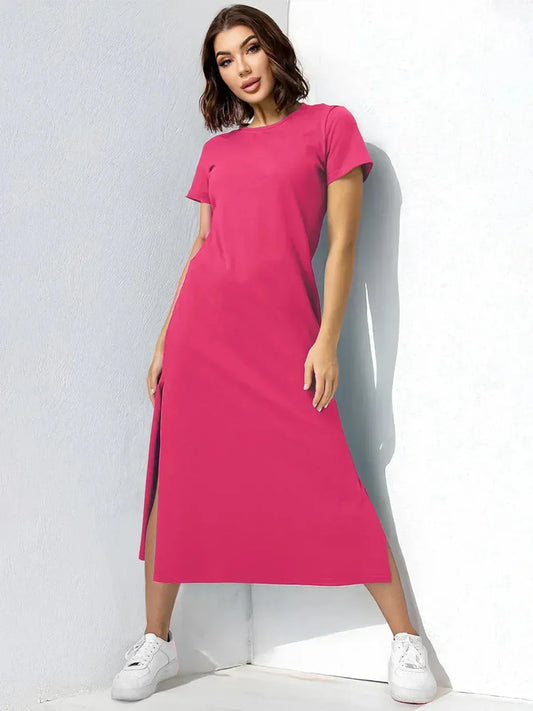 Breeze Midi Dress in vibrant raspberry-pink, featuring side slits and short sleeves, perfect for summer and casual events.