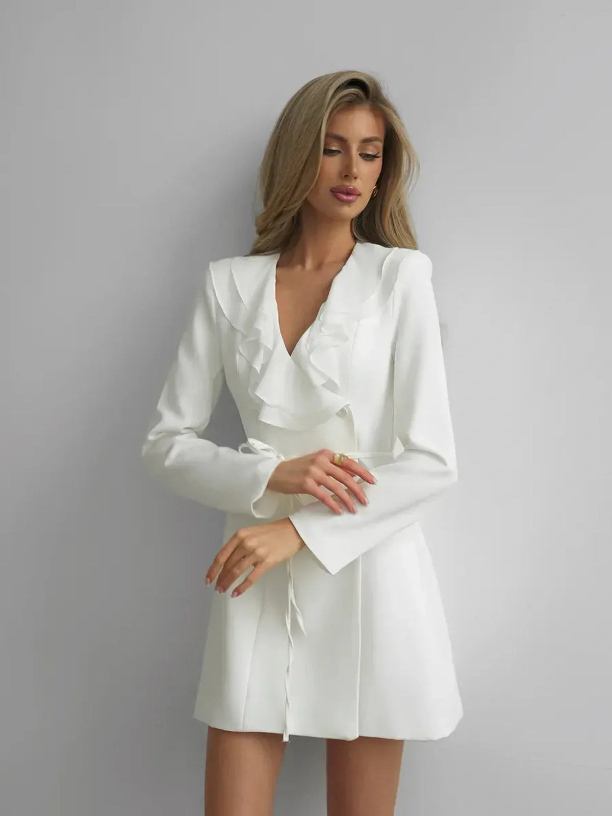 Ruffle Icon Mini white long sleeve dress with ruffles, perfect for weddings, graduation, and events.