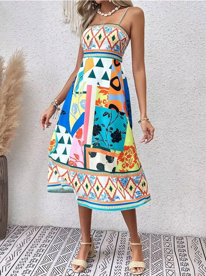 Vibrant Festival Bloom Midi Dress featuring colorful patchwork and floral patterns, perfect for summer and wedding guests.