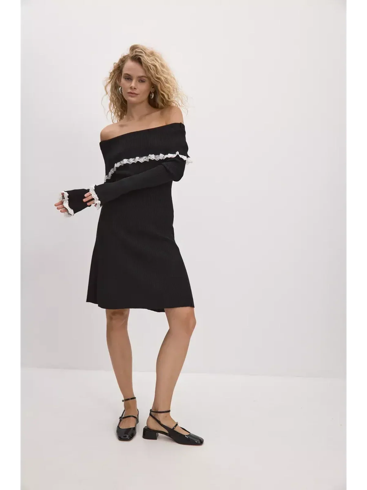 Black lace off-shoulder mini dress with long sleeves, perfect for summer, weddings, and formal occasions.