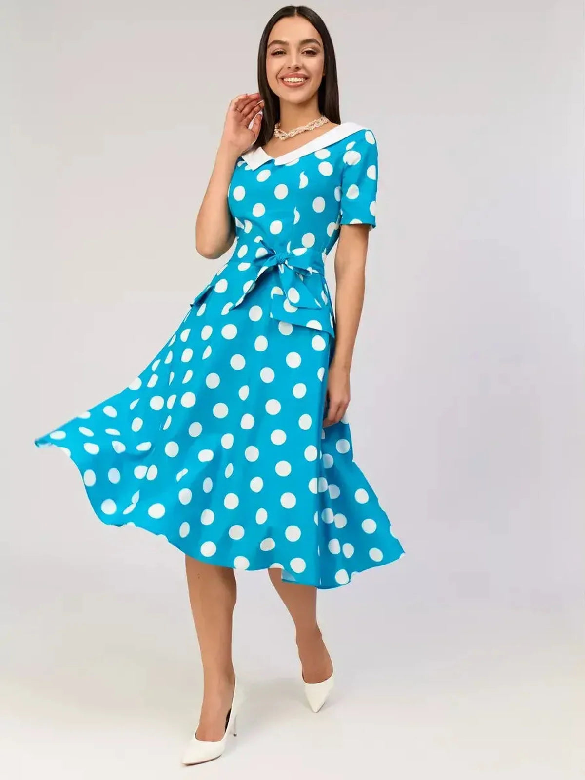 Retro Charm Midi Dress featuring polka dots and a contrast collar, perfect for summer events and weddings.