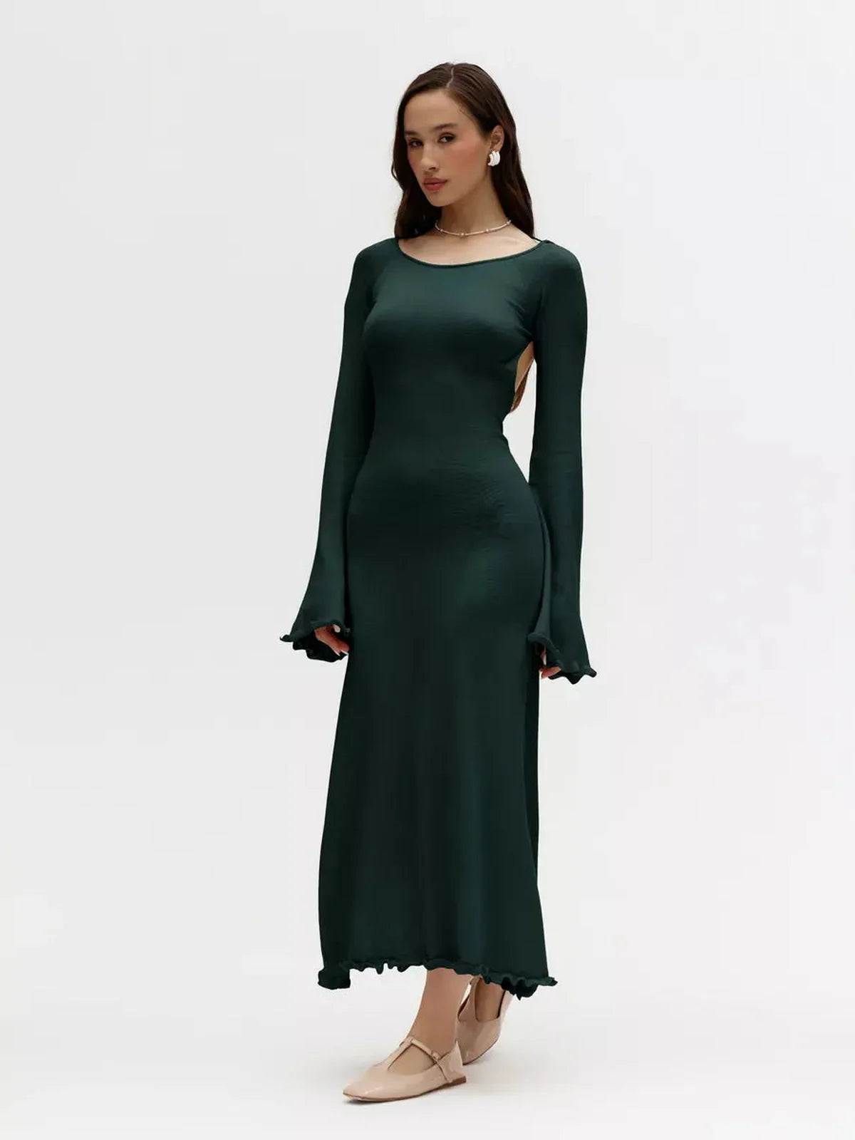 Serenity Knit Midi Dress in dark green featuring open back, flounced sleeves, and a form-hugging silhouette for elegant occasions.