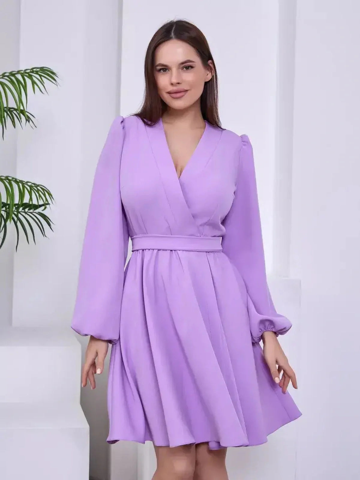 Lilac Whisper long sleeve dress showcasing elegance with a flattering silhouette, ideal for weddings, proms, and formal occasions.