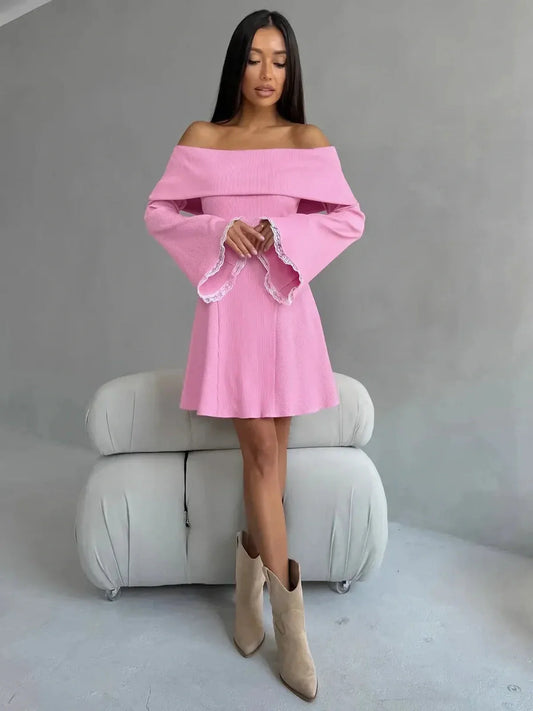 Blush Belle Mini Dress: Off-shoulder pink dress with flared lace cuffs, perfect for summer events and weddings.