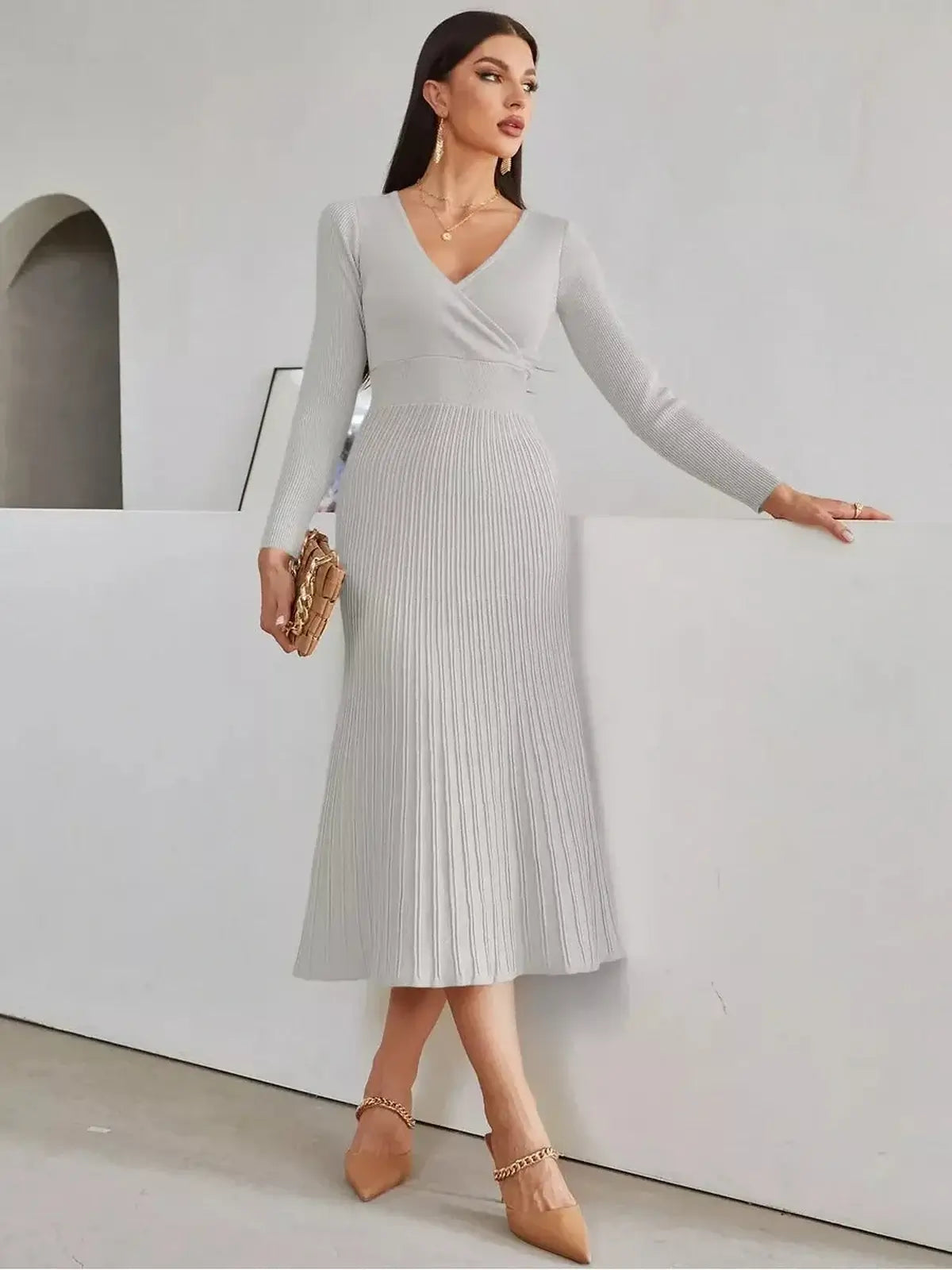 Sculpted Grace Midi Dress in light gray with a V-neckline and pleated skirt, perfect for weddings and formal occasions.