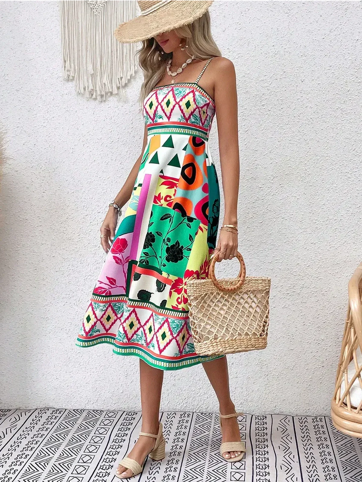 Tropica Muse Midi Dress in vibrant patterns, perfect for summer weddings and elegant outings.