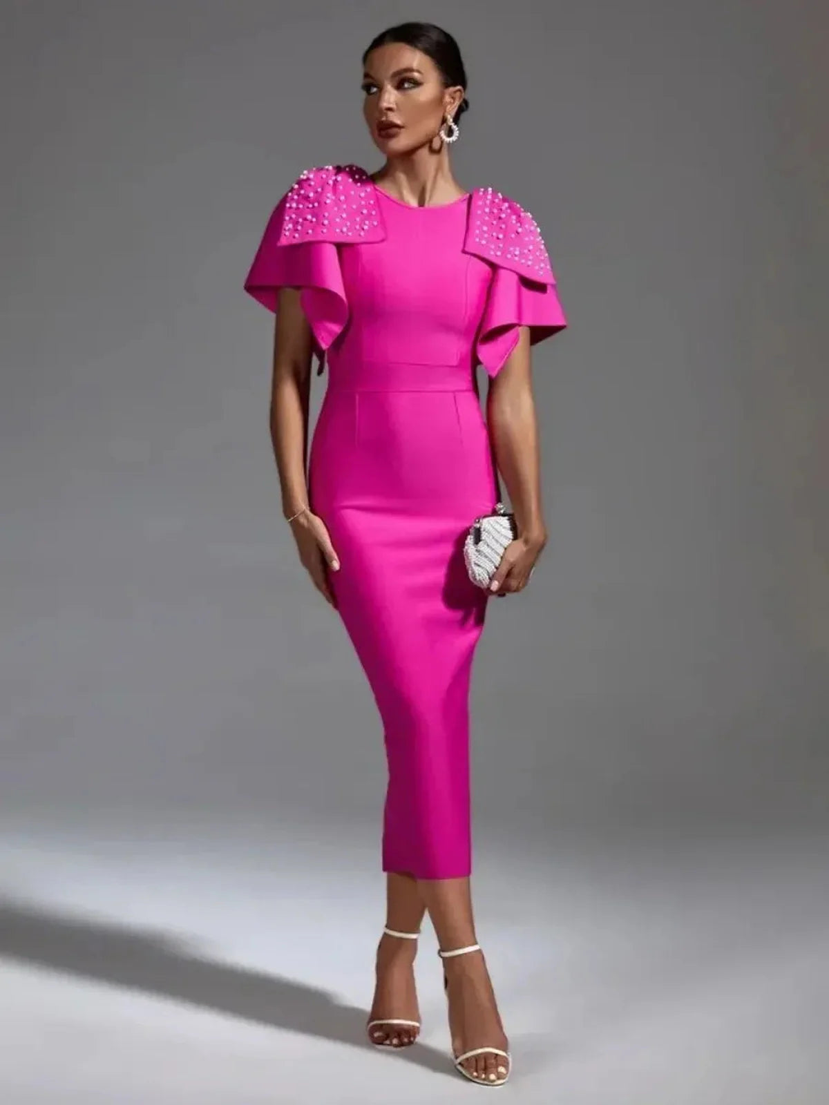 Bold fuchsia midi dress with pearl-embellished cape, perfect for weddings, proms, and formal occasions.