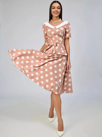 Vintage Muse Midi Dress featuring polka dots and white collar, perfect for summer events and wedding guests.