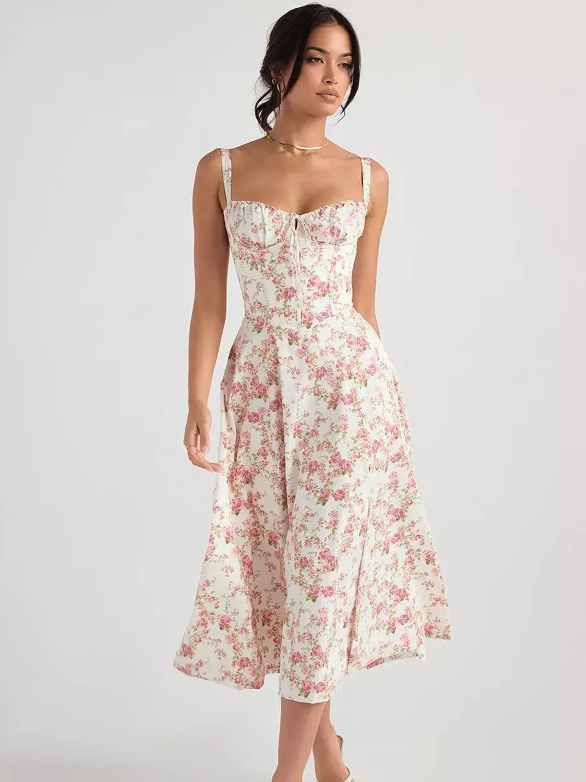 Rose Garden Midi Dress featuring soft floral print, sweetheart neckline, and flowy A-line skirt, perfect for summer events.