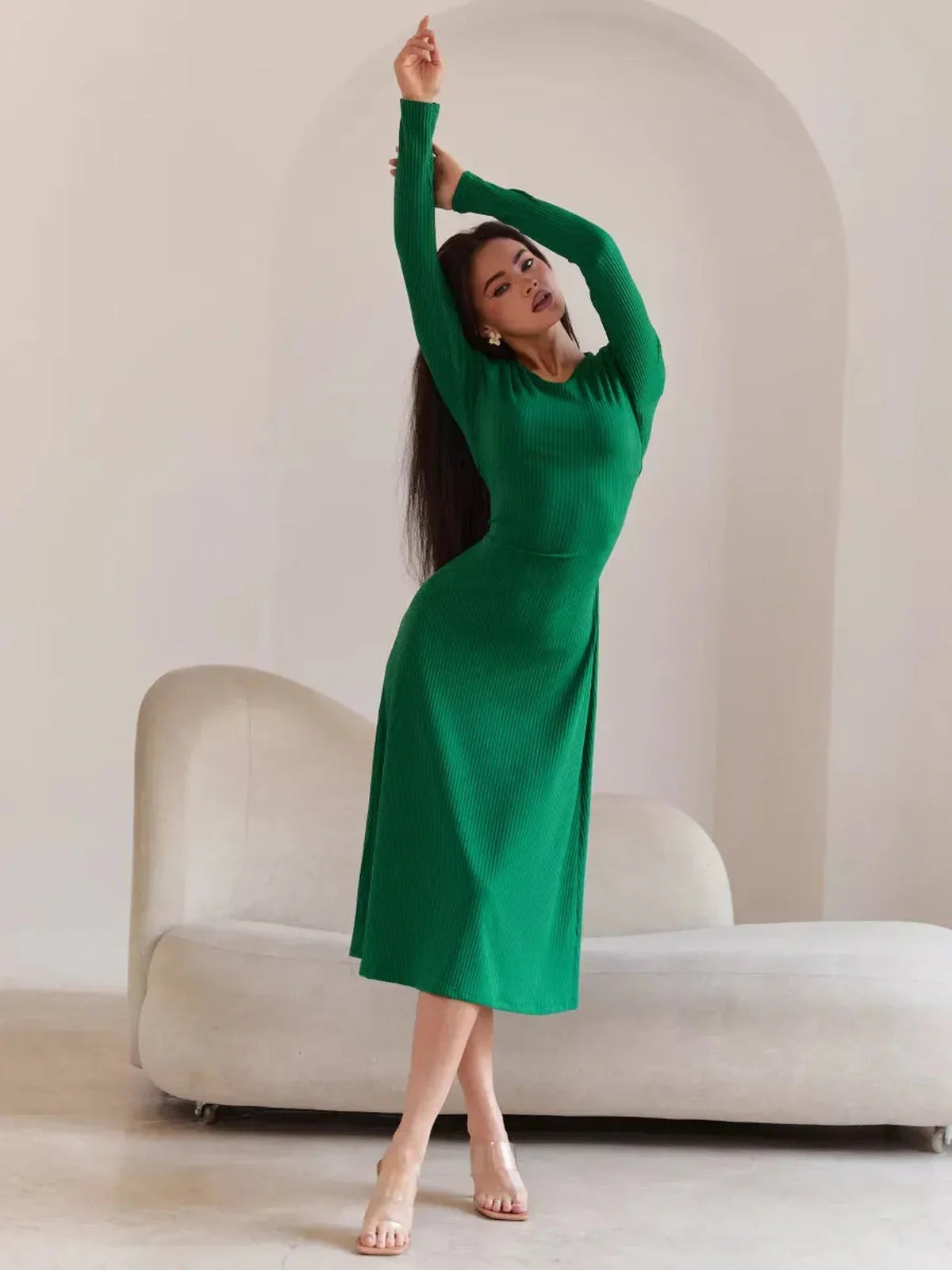 Elegant green Luxe Sculpt Midi Dress showcasing a figure-hugging fit and stylish tie-back design, perfect for chic occasions.