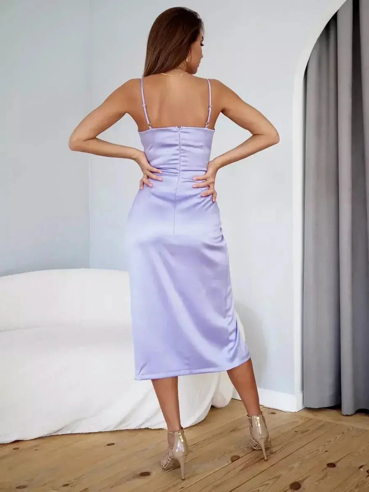 Elegant lilac midi dress featuring a sleek silhouette and satin finish, perfect for summer celebrations and formal occasions.
