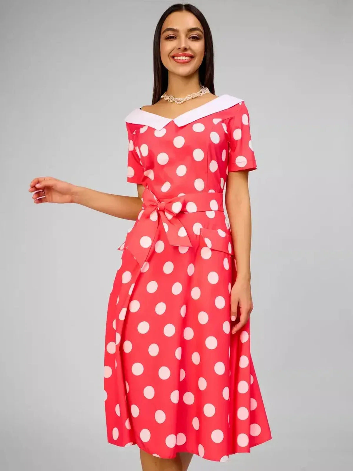 Sailor Chic Midi Dress in vibrant pink with white polka dots and a sailor collar, perfect for summer and special occasions.