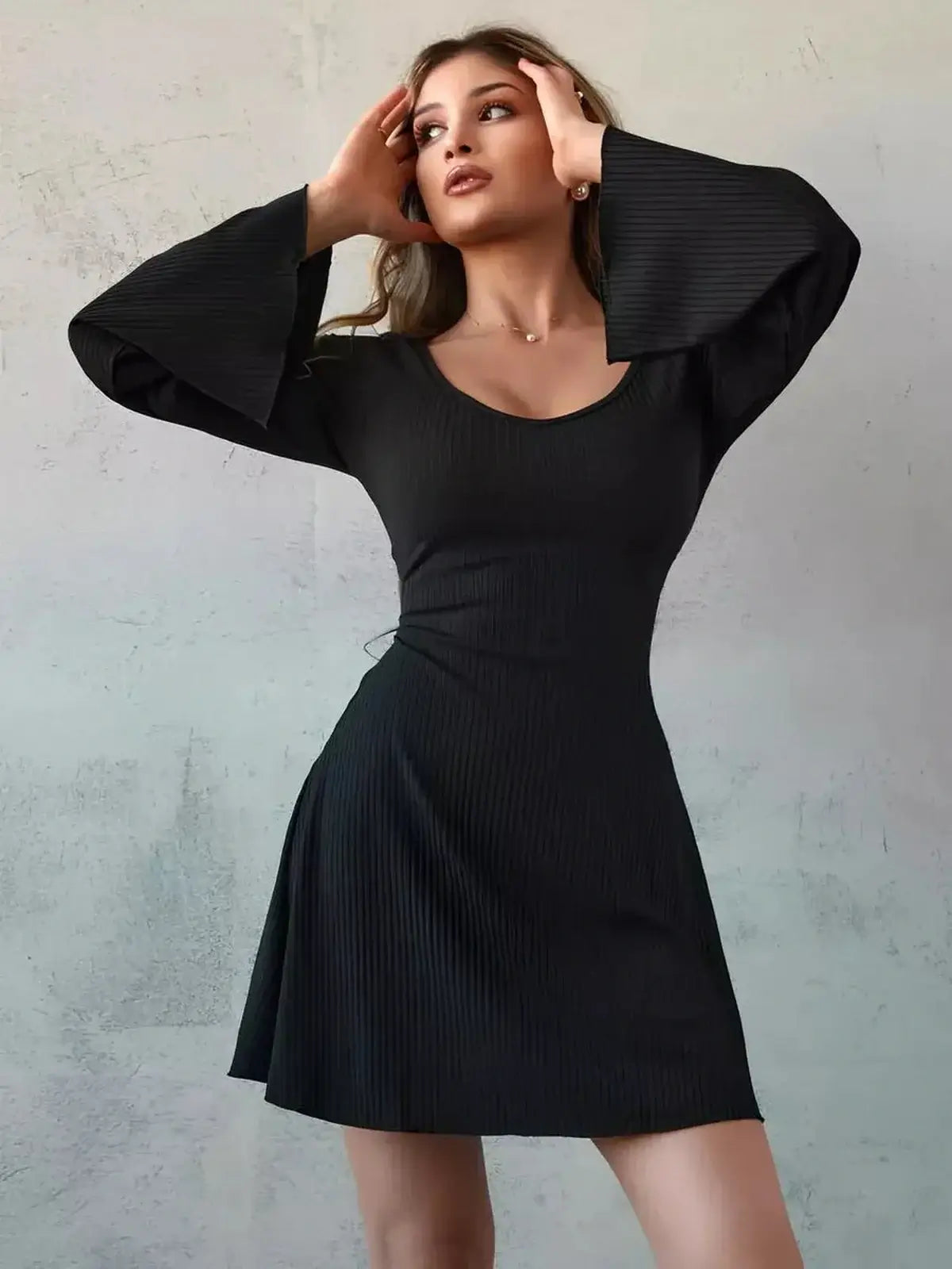 Sculpt Flare Midi Dress in black with bell sleeves, showcasing a chic U-neckline and flattering silhouette.