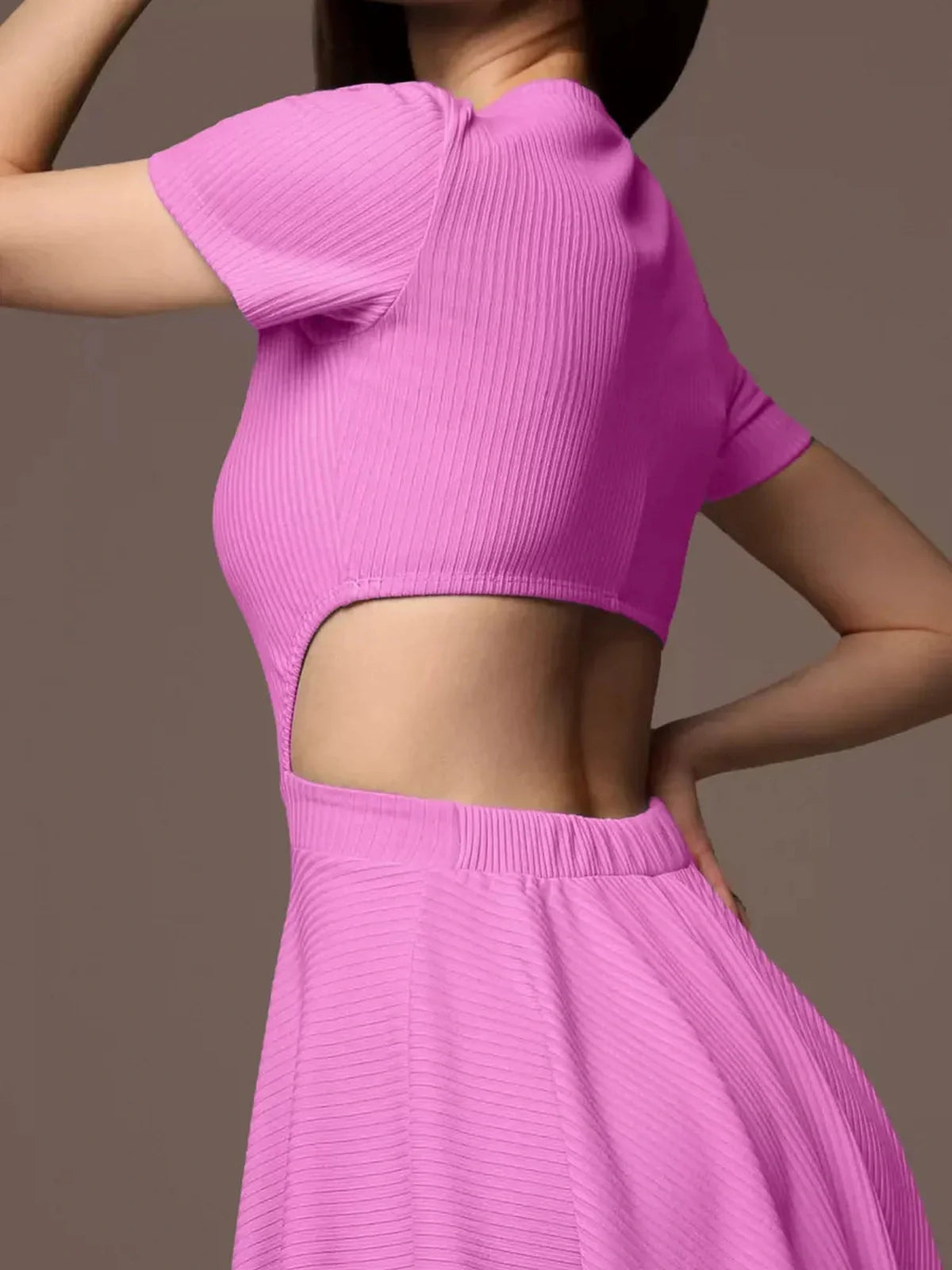 Pink cutout charm mini dress featuring a fitted bodice and flared skirt, ideal for summer or special occasions.