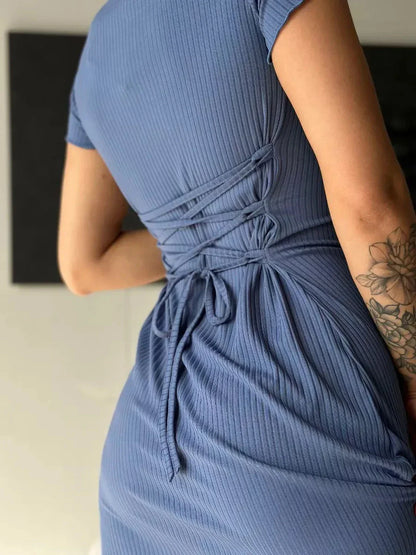 Back view of the Sculpted Grace Midi Dress featuring a corset tie detail, perfect for summer weddings or formal events.