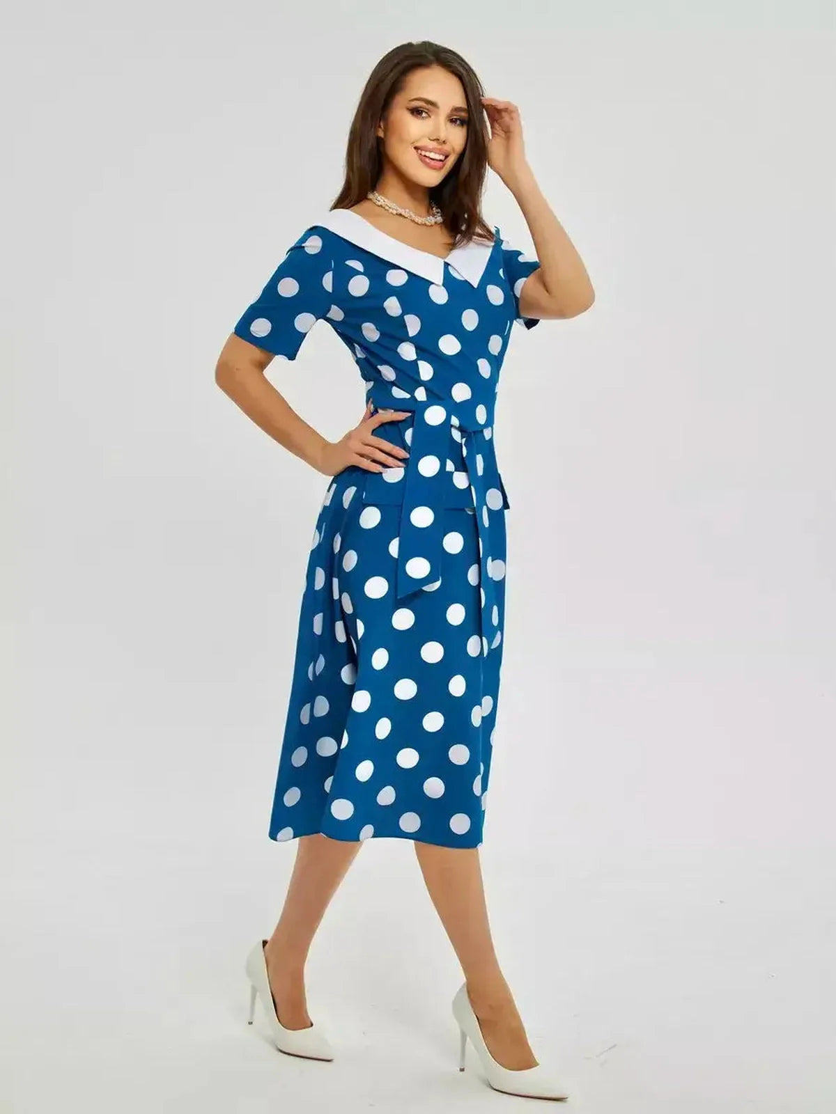 Stylish Pearl Dot Midi Dress in dark teal with white polka dots, wide collar, and tie waist, perfect for summer occasions.