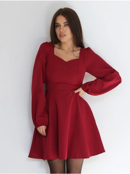 Ruby Flare red mini dress with sweetheart neckline and long sleeves, perfect for weddings, proms, and special occasions.