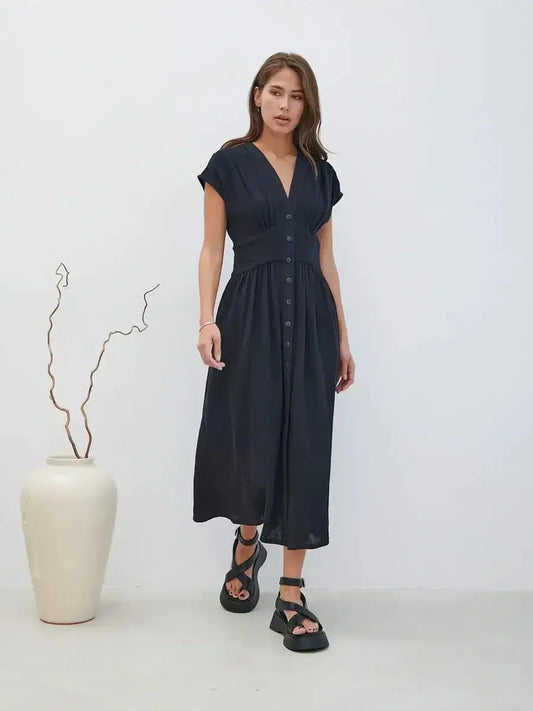 Sable Grace Midi Dress in navy with V-neck and button detail, perfect for summer or formal occasions.