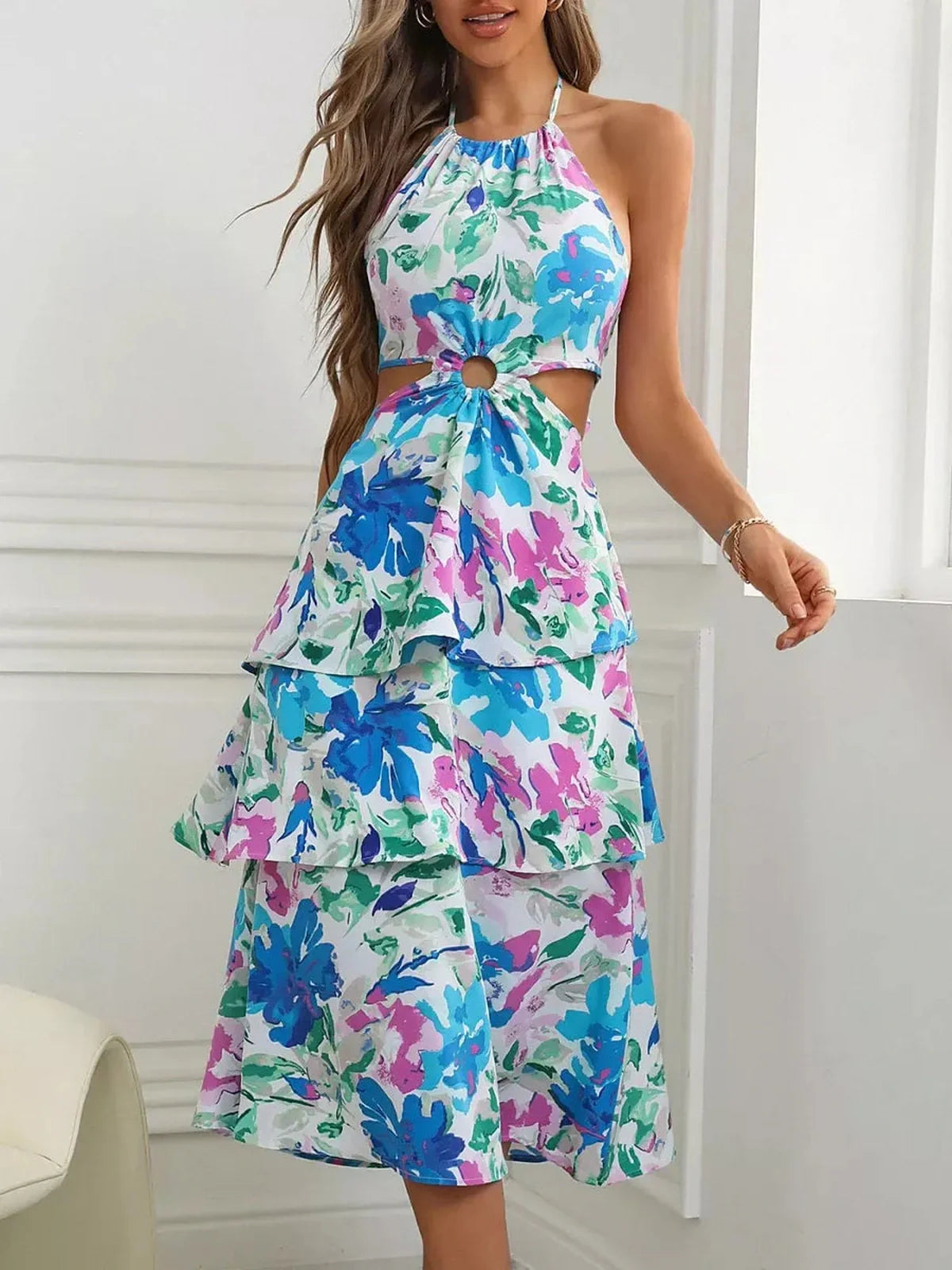 Petal Bloom Midi Dress featuring a vibrant floral print in pink, teal, and green, perfect for summer and special occasions.