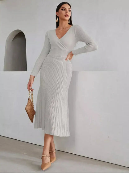 Sculpted Grace Midi Dress featuring a sleek ribbed texture and elegant fit, perfect for weddings and formal events.