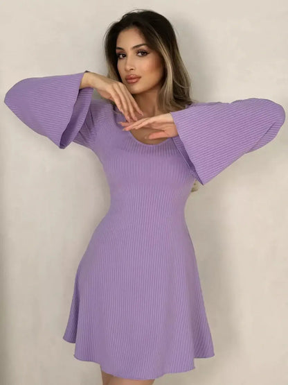 Lilac Grace Mini Dress featuring wide bell sleeves and a flattering fit-and-flare silhouette, perfect for weddings or casual outings.