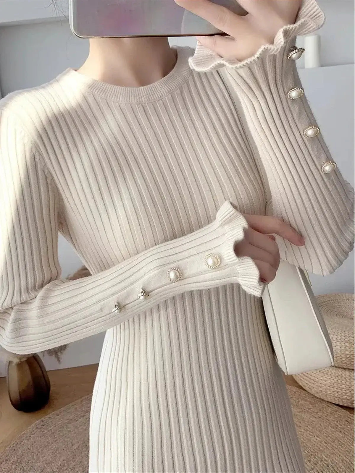 Elegant Pearl Flare Midi Dress with ribbed texture and decorative pearl buttons, perfect for weddings or formal occasions.