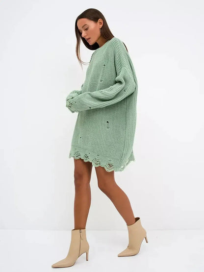 Frost Knit Mini sweater dress in mint green with distressed details, styled as a casual outfit for women.